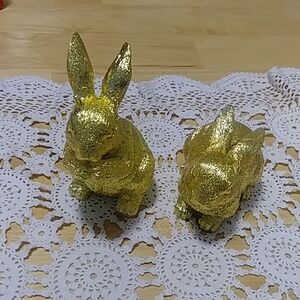 Easter bunnies in a beautiful gold tone. felt padding on bottom.